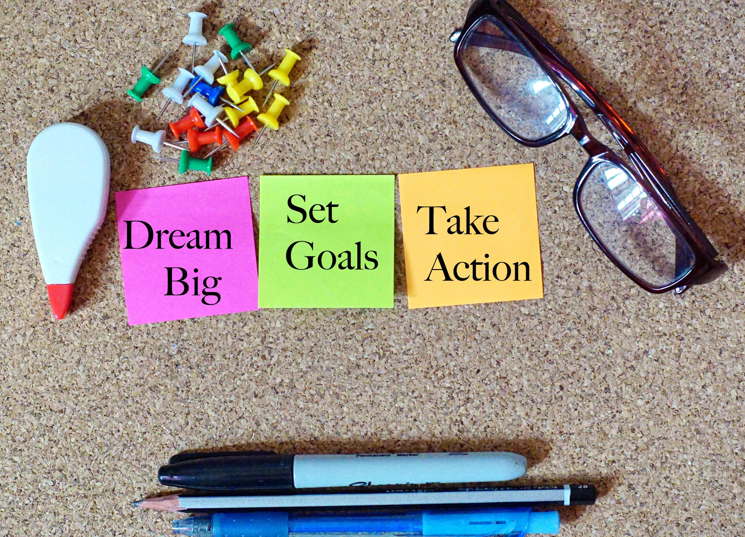 An image of 3 Post-it notes that read, "Dream Big" "Set Goals" and "Take Action".